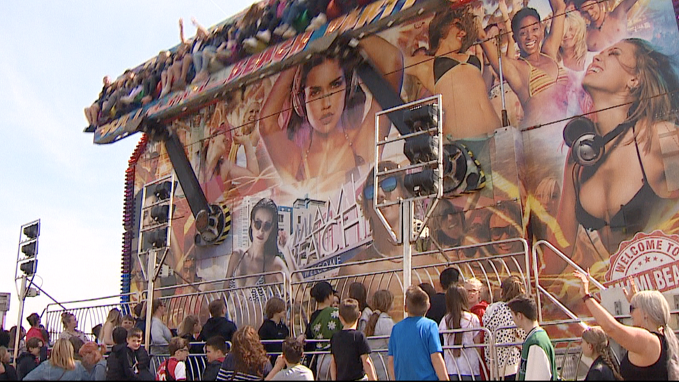 Crowds queuing for a ride at Clacton amusements