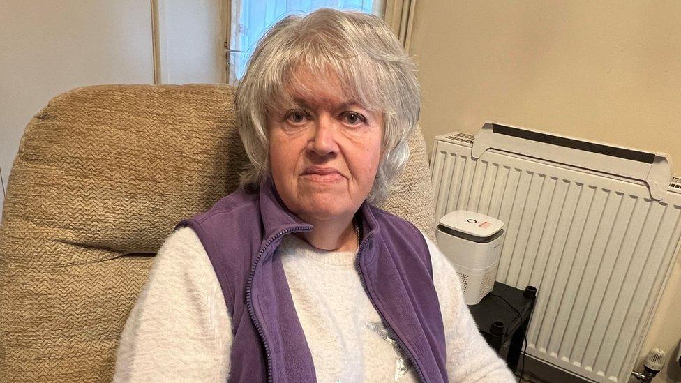 Josie Parsons sat in an armchair