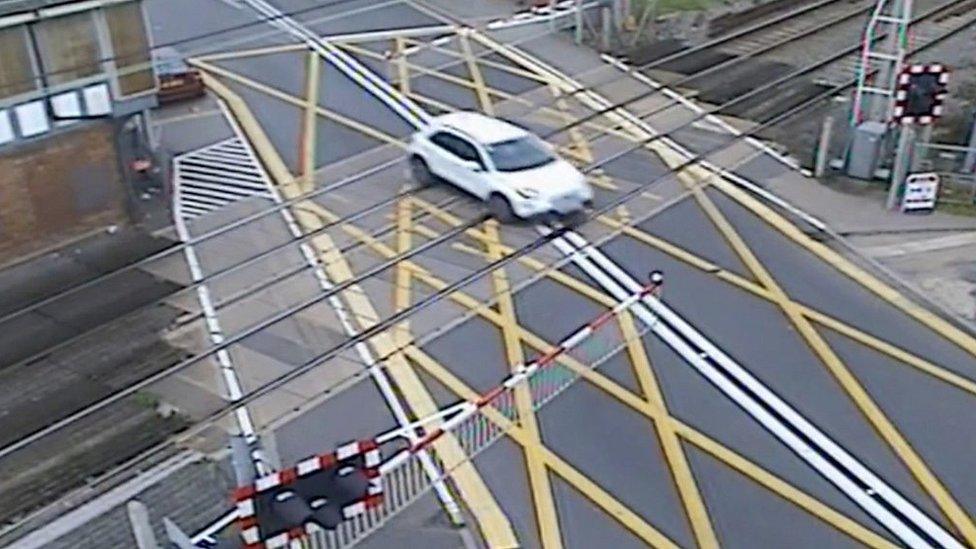 Car avoiding closing barriers