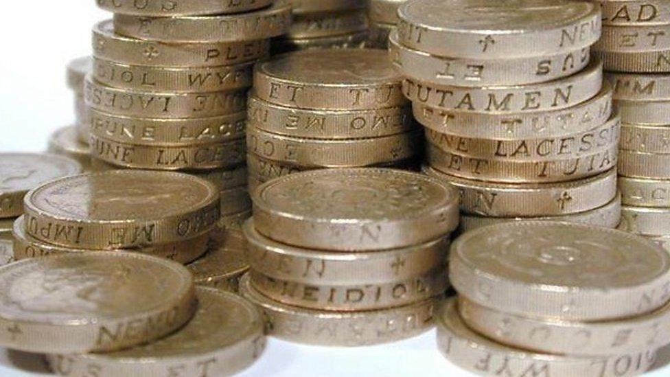 A pile of pound coins