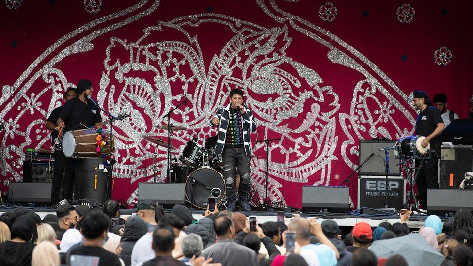 Mela performers on stage