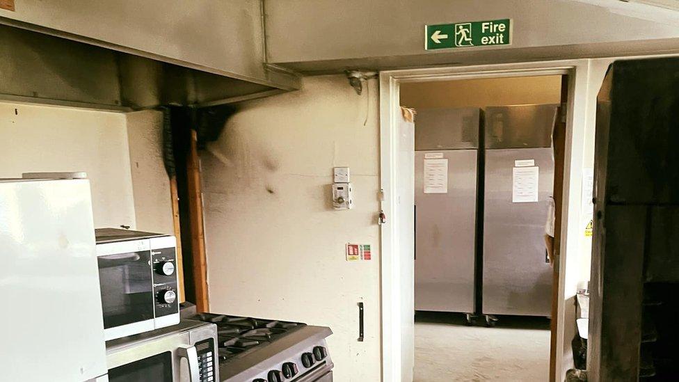 A fire damaged kitchen in an Essex care home