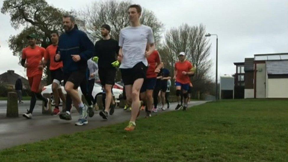 Runners in Little Stoke Park near Bristol