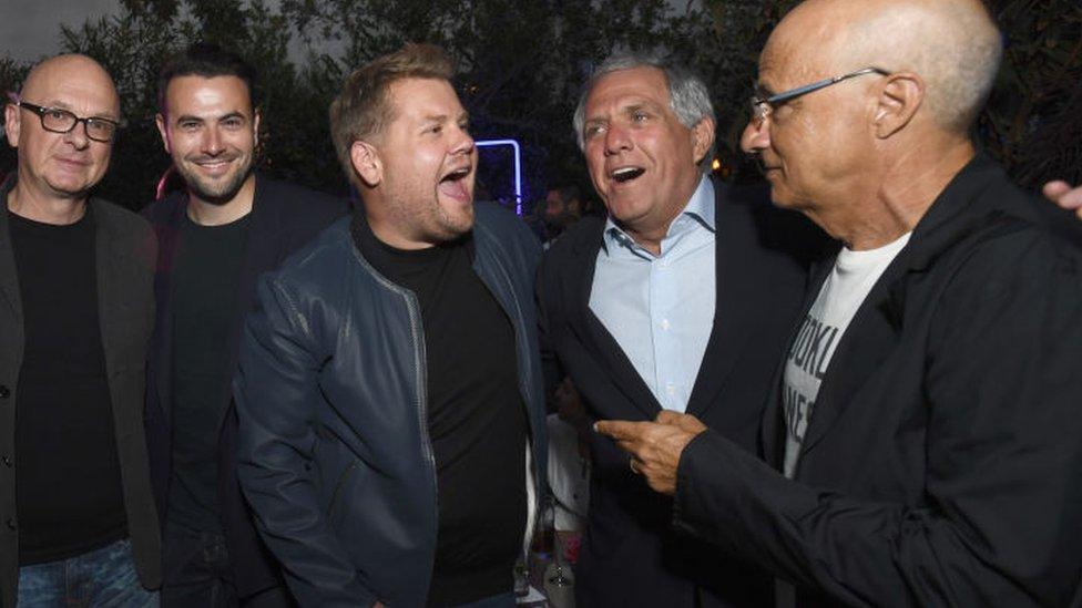 Moonves (second from right) singing with CBS chat show host James Corden