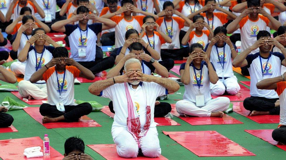 Indian Prime Minister Narendra Modi performs yoga to mark the international Day of Yoga, in Lucknow, Uttar Pradesh, India 21 June 2017