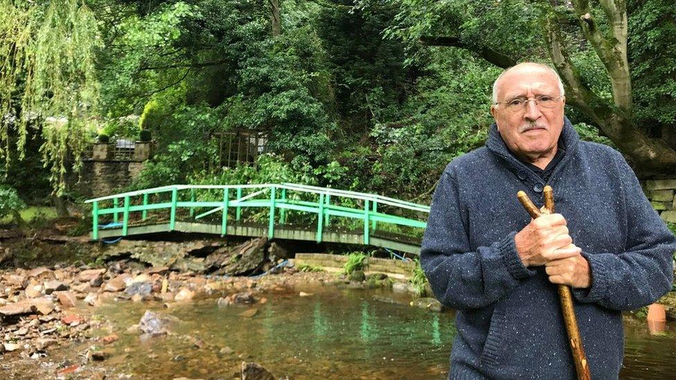 Bryan Ross in front of the broken bridge