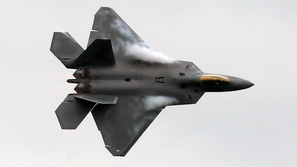 A US F-22 Raptor fighter flies during an aerial display at Farnborough air show