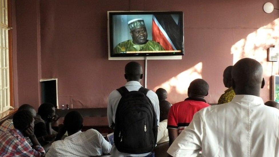 South Sudanese watch Riek Machar on TV