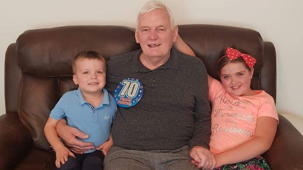 Gareth Davies with his two grandchildren