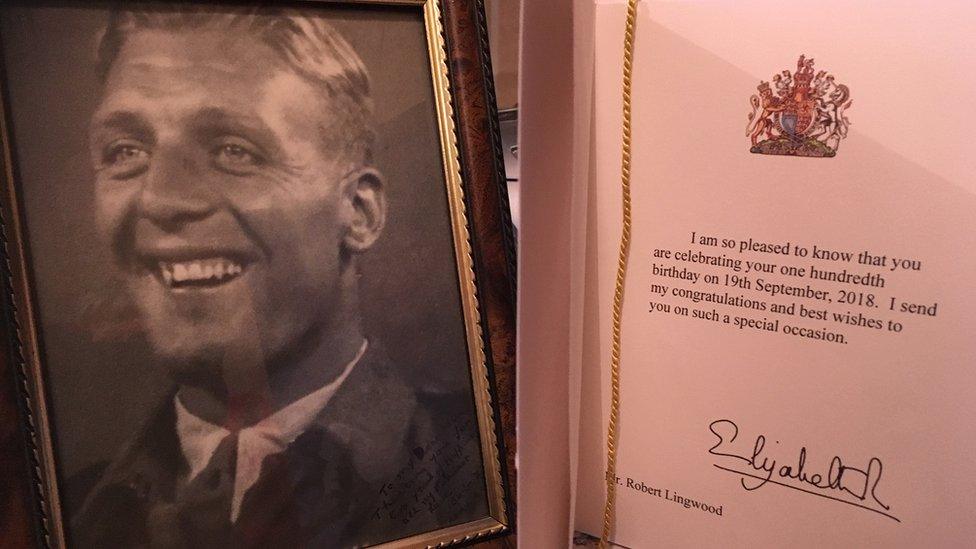 An image of Bob with the interior of the card from the Queen