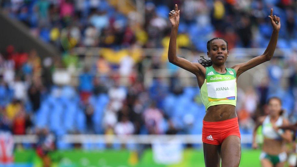 Almaz Ayana celebrates winning the Women's 10,000 Meters Final