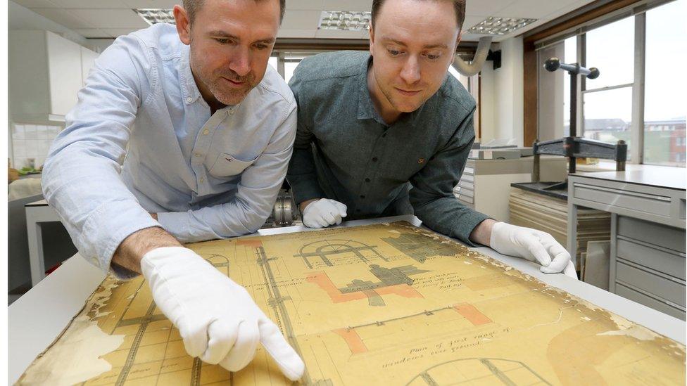 Dr Seamas Lawless (left) pointing at floor plan of 1922 Public Record Office Ireland, and (right) Dr Peter Crooks