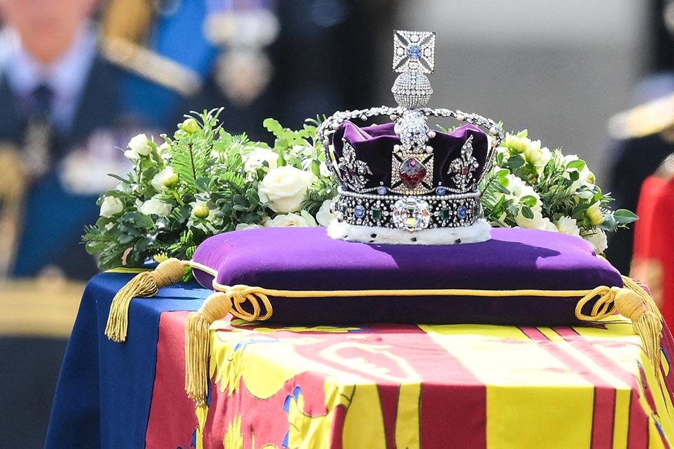 King Charles III and members of the royal family behind Queen Elizabeth II's flag-draped coffin as it is taken in procession on a Gun Carriage of The King's Troop Royal Horse Artillery from Buckingham Palace to Westminster Hall on 14 September 2022