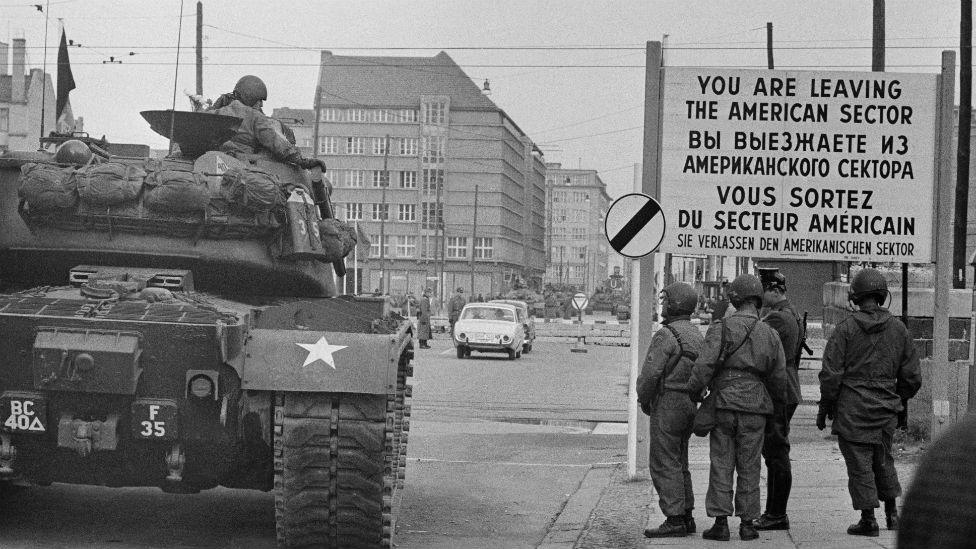 American tanks and troops at Checkpoint Charlie, a crossing point in the Berlin Wall