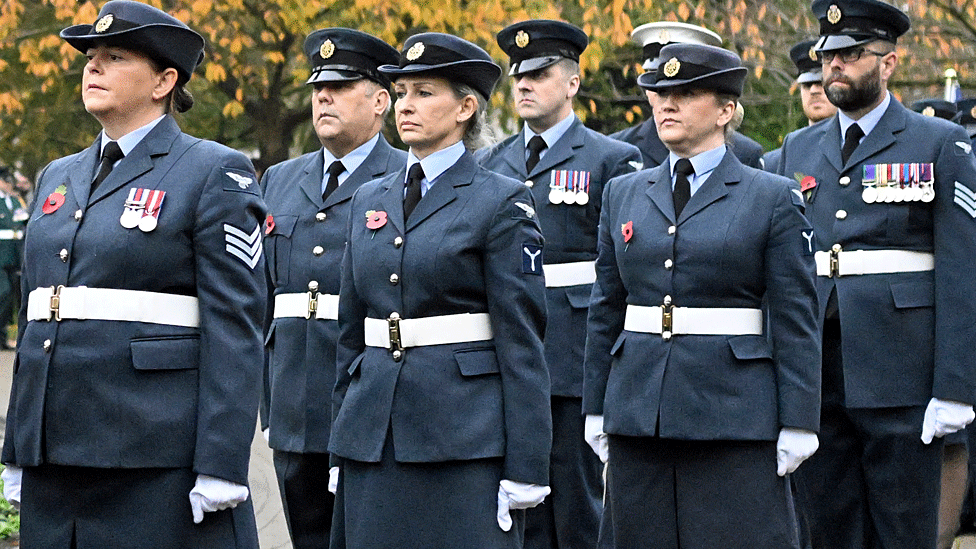 Male and female service personnel in RAF uniforms