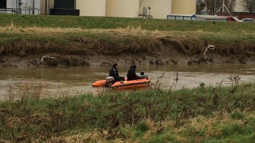 Two men in a boat