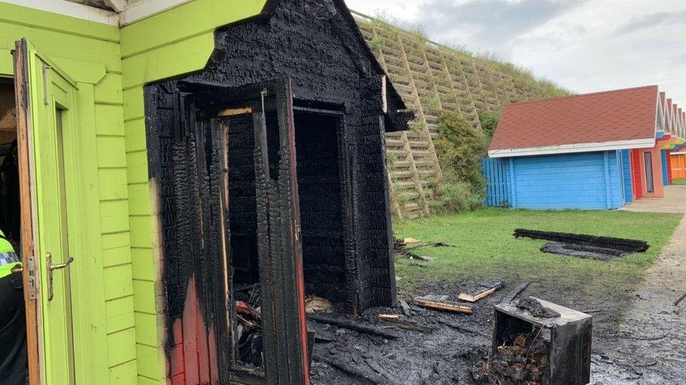 Burnt down beach hut