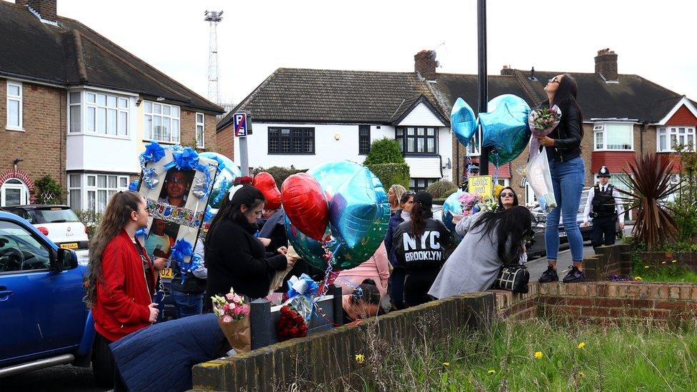 Friends and relatives of Henry Vincent bring birthday tributes to the scene on South Park Crescent in Hither Green