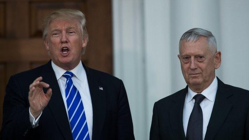 President-elect Donald Trump speaks as he stands with retired United States Marine Corps general James Mattis after their meeting at Trump International Golf Club.