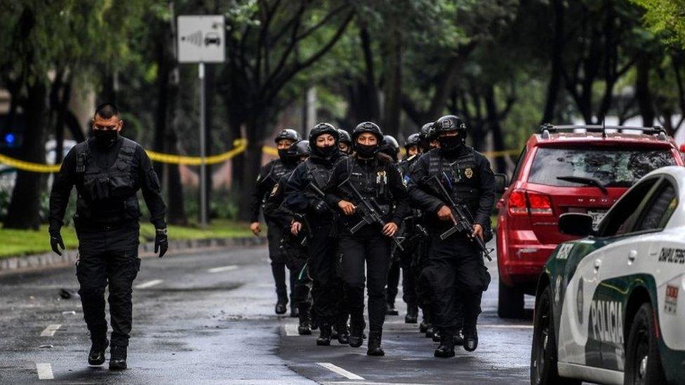 Police officers are deployed after Mexico City's Public Security Secretary Omar Garcia Harfuch was wounded in an attack in Mexico City, on June 26, 2020.