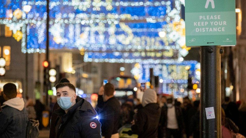 Christmas shoppers before lockdown on Oxford Street