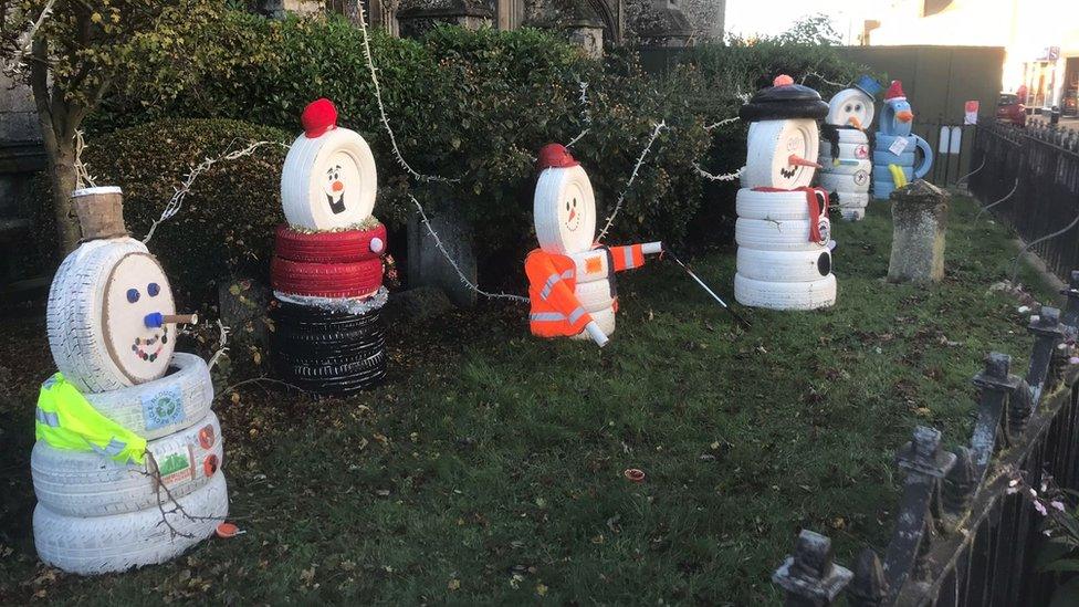 Snowmen made from old tyres in Sudbury