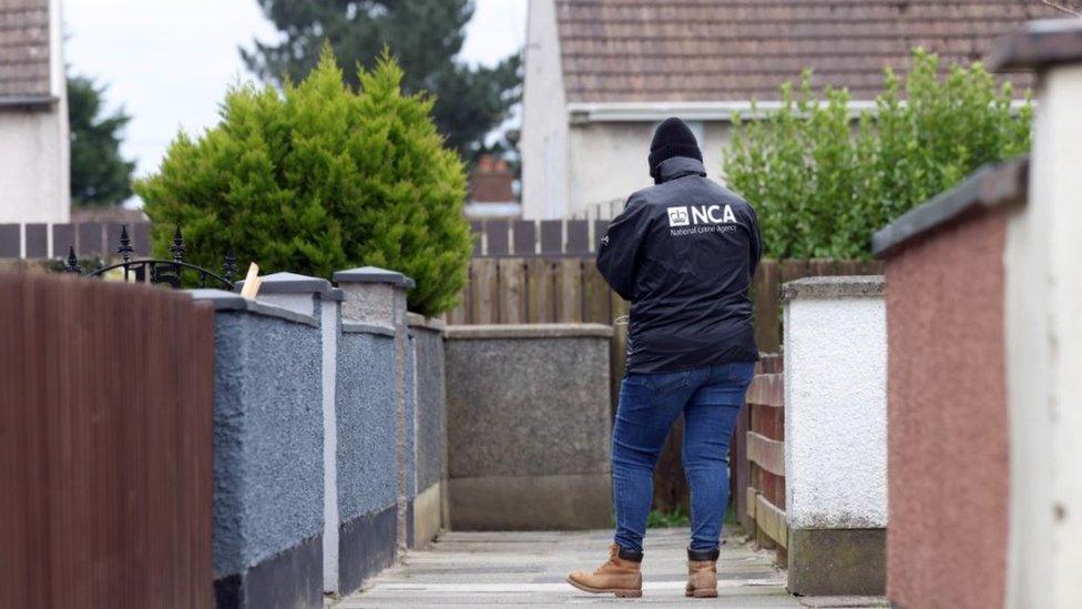 An officer from the National Crime Agency in Carrickfergus on Tuesday