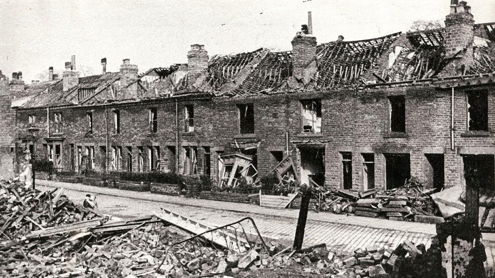 Street of damaged houses