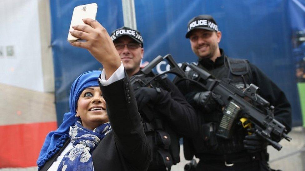 Woman with armed police