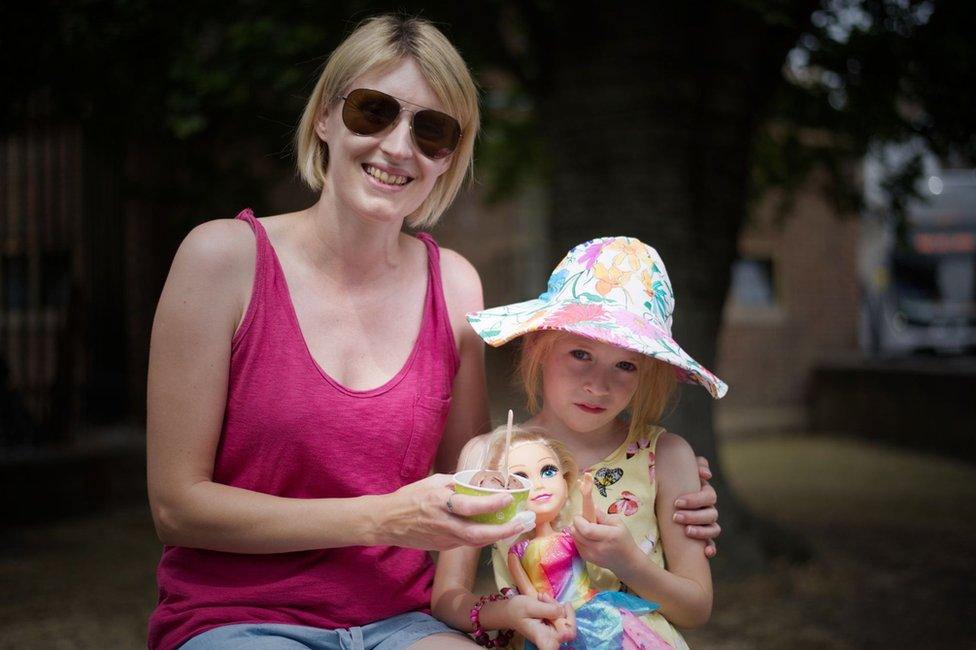 Kelly and Jasmine, with her doll