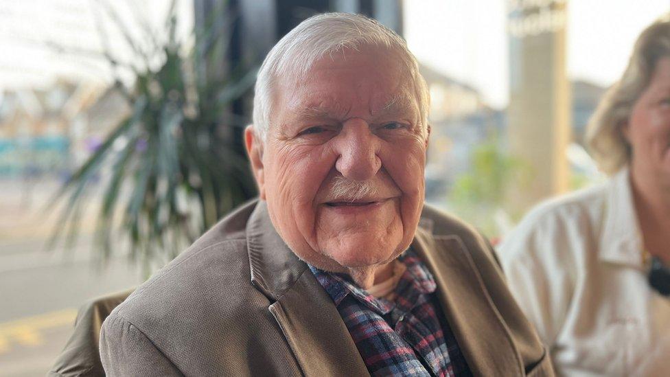 Arthur Oborne sitting down in a cafe