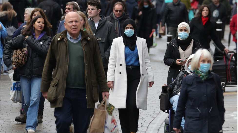 People walking along a high street