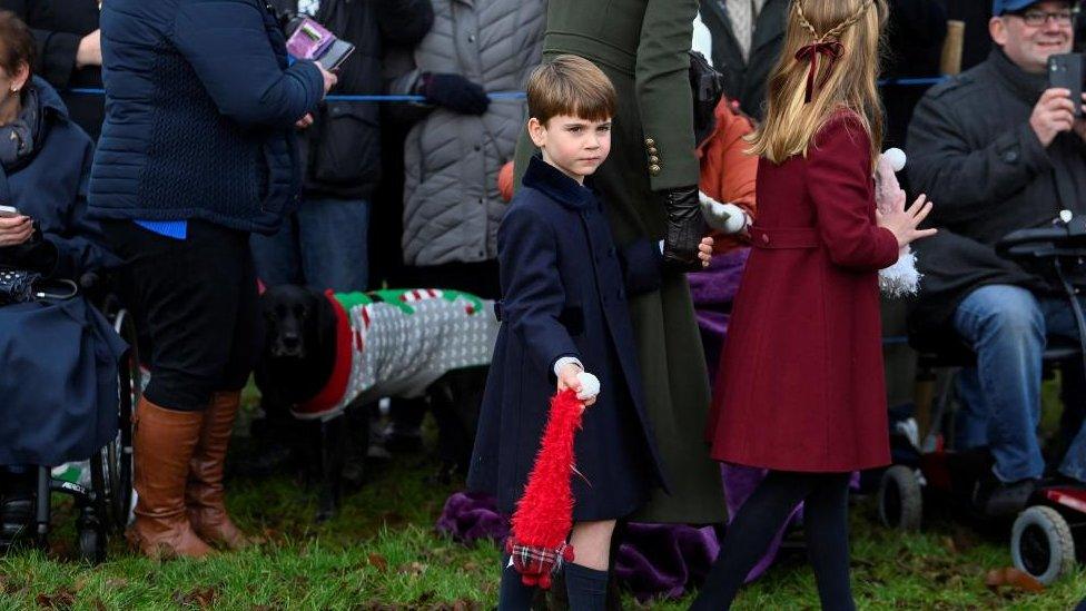 Prince Louis outside the church at Sandringham