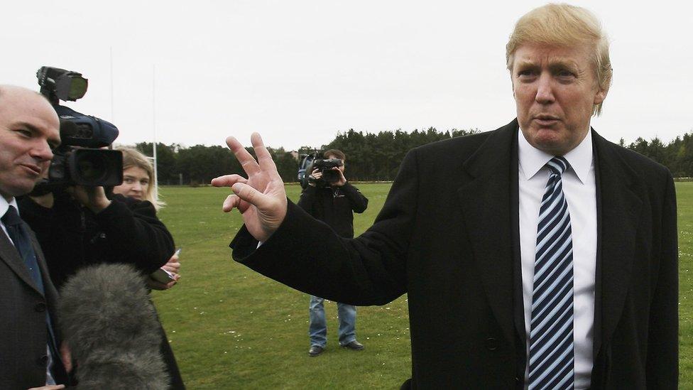 Trump, shown with journalists in Scotland in 2006