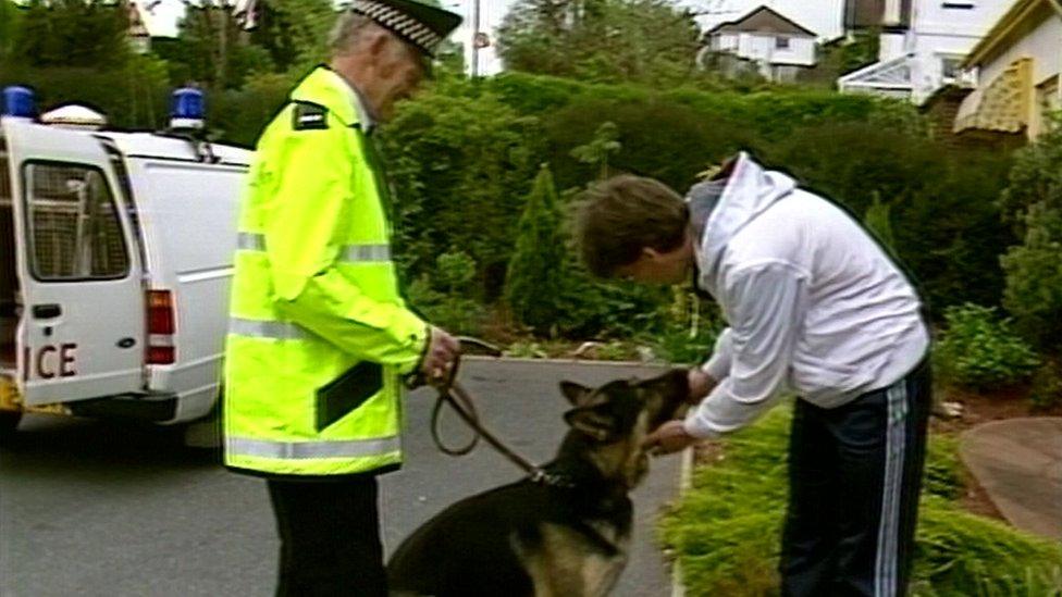 Jim McNichol meeting Bryn the police dog