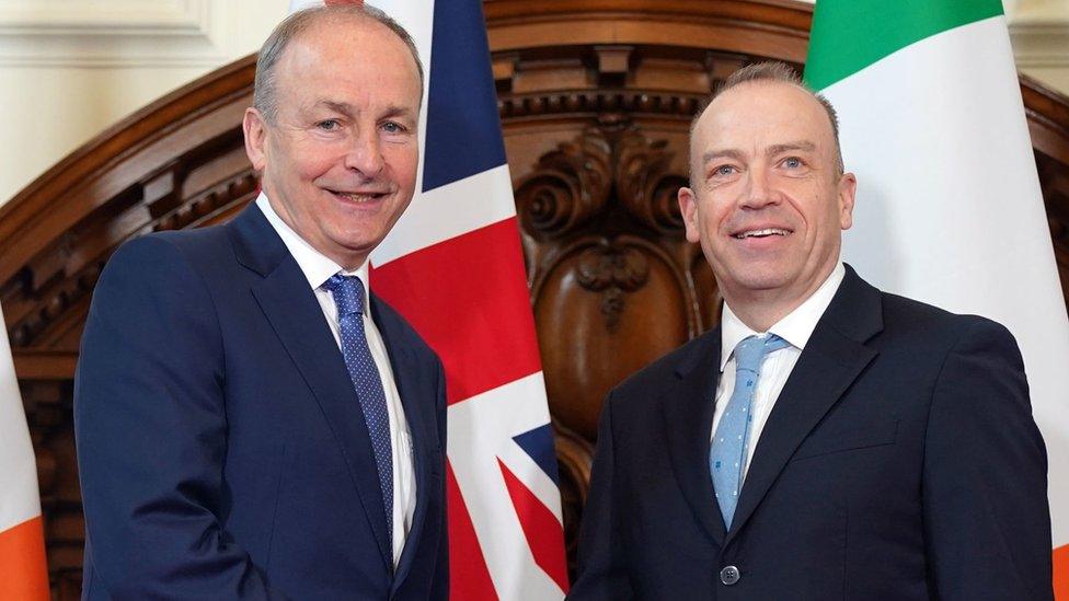 Micheál Martin and Chris Heaton-Harris arrive for the British Irish Intergovernmental Conference press conference