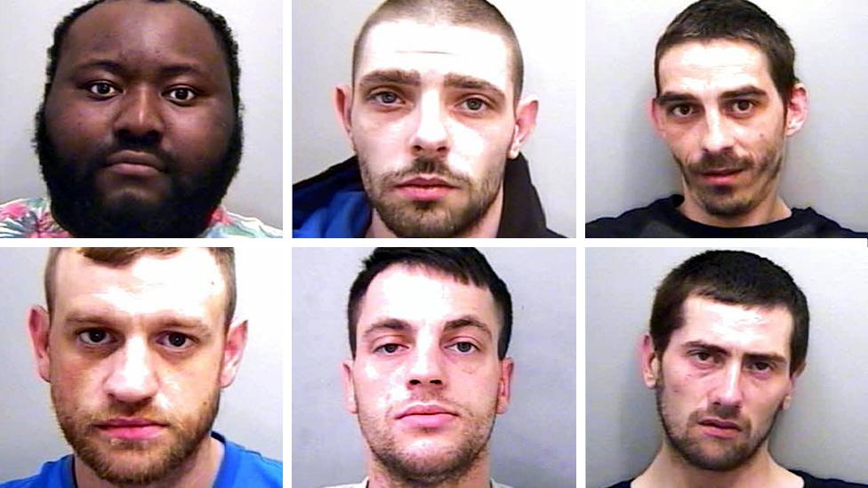 Police mug shots of six men