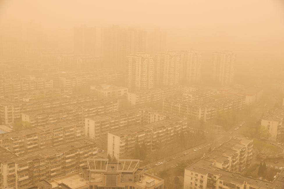 Buildings are seen during a sandstorm on 15 March 2021 in Beijing