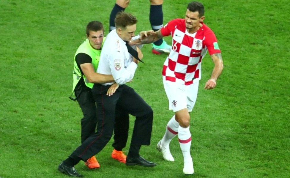 Lovren holding intruder, 15 July 18