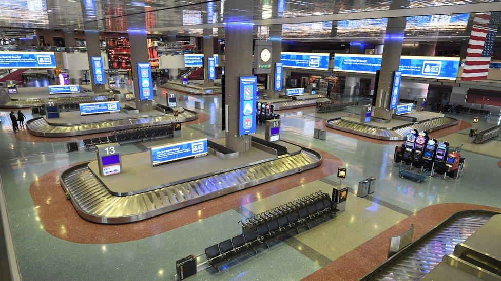 The nearly empty baggage claim area at McCarran International Airport in Las Vegas, Nevada, on 19 March 2020