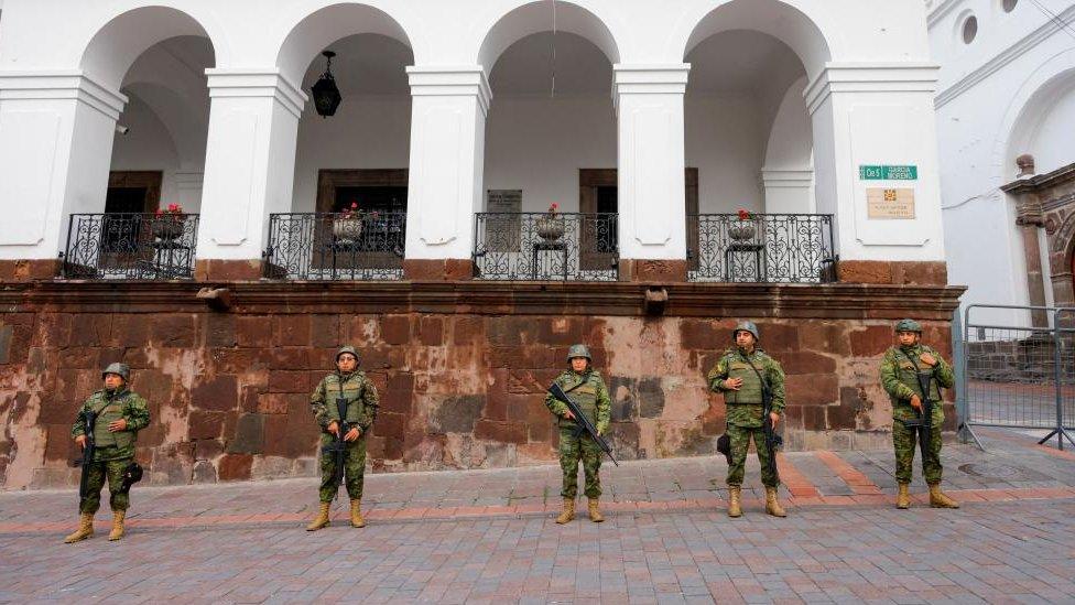 Soldiers stand guard outside the presidential palace following a wave of violence around the nation, prompting President Daniel Noboa to declare gangs to be terrorist organisations to be hunted by the military, in Quito, Ecuador January 10, 2024.