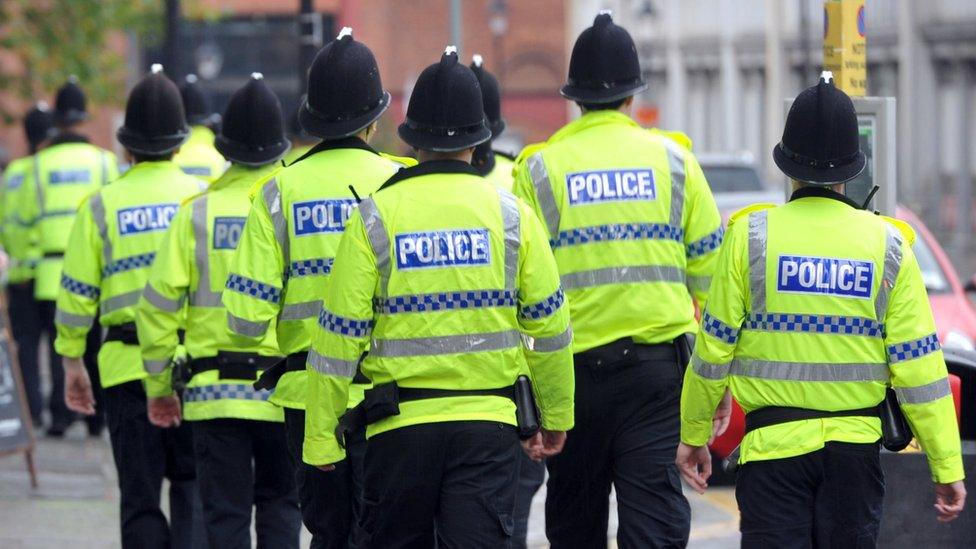 Unidentified police officers in hi-vis jackets