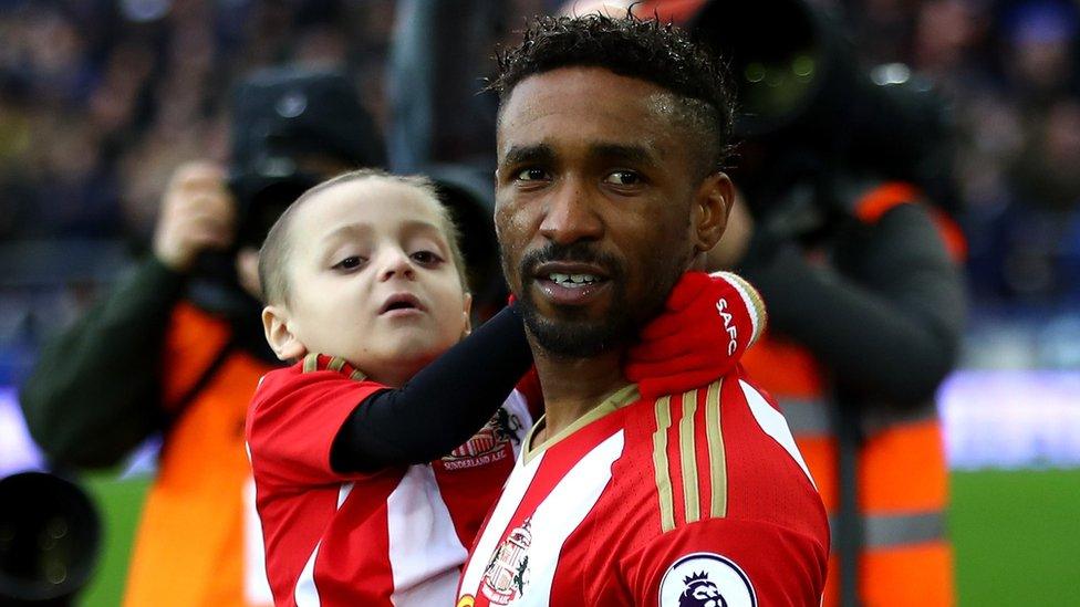 Jermain Defoe with Bradley Lowery