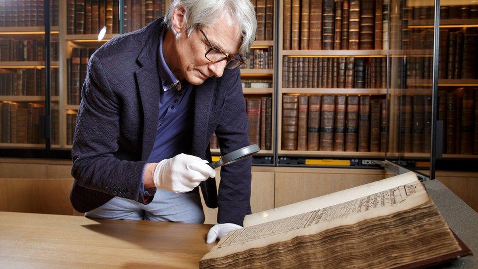 Geoffrey Marsh looking at archived records