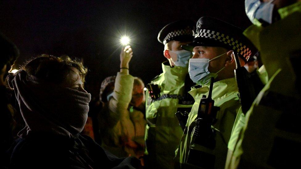 Police and demonstrators at Sarah Everard vigil