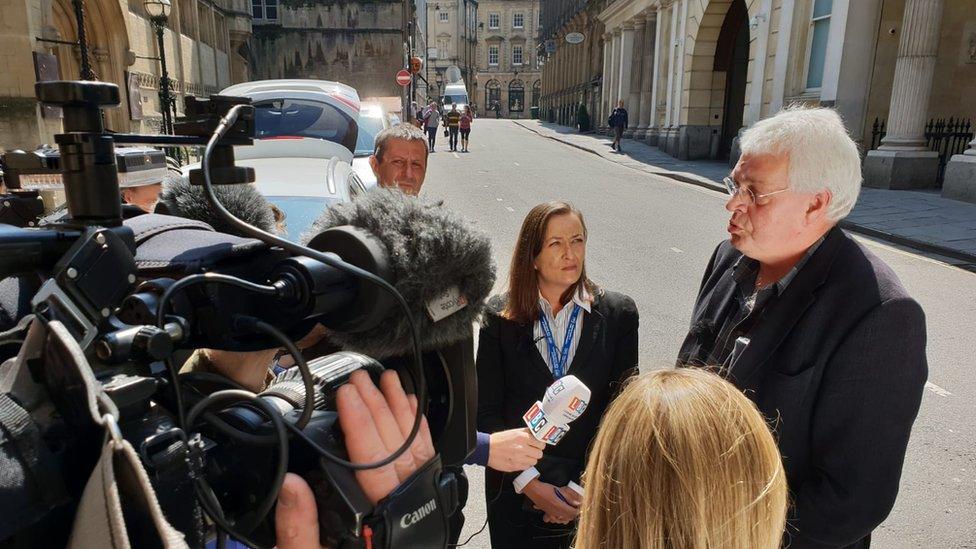 Kees van Dongen talking to reporters outside court