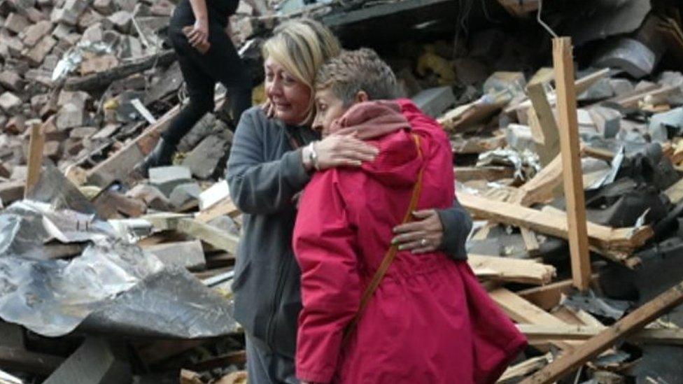 Campaigners at the site of the Crooked House ruins