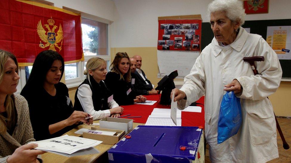 Woman casts her ballot