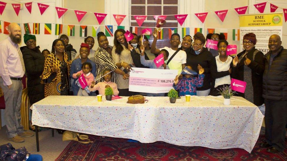 Community group celebrating lottery award