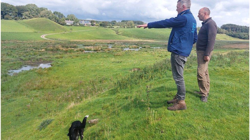 Ian Ryding and Ian Bell and dog